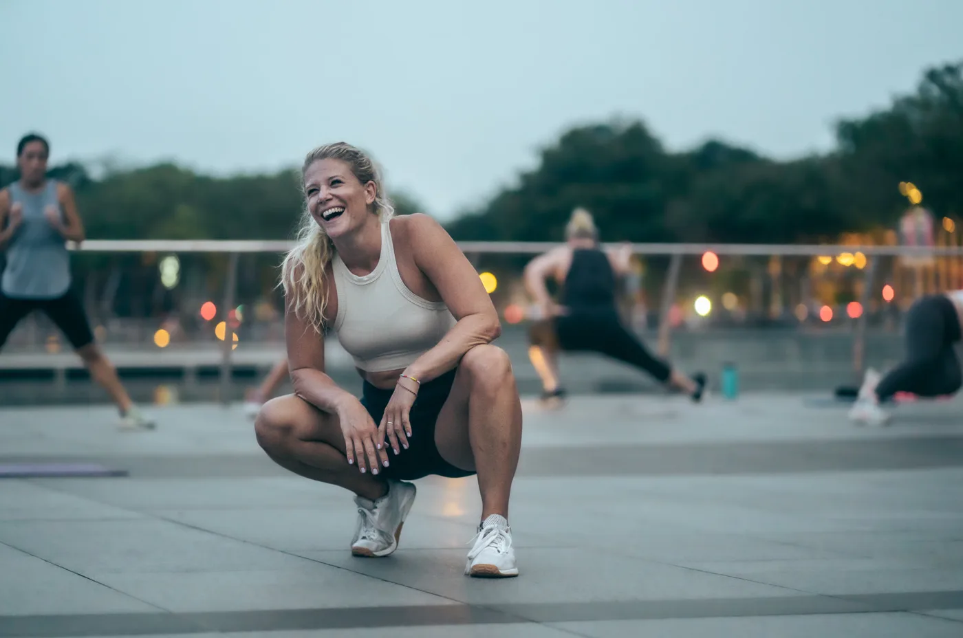 Lizzie Wright laughing during an outdoor training session