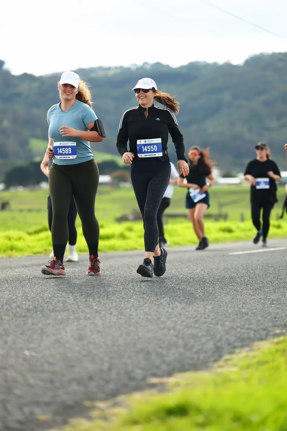Two women running a race together