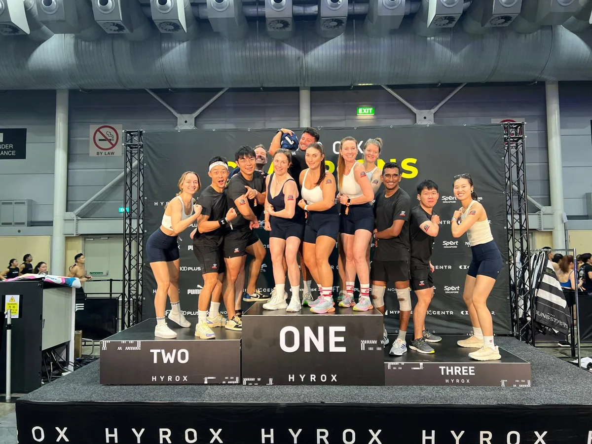Team celebrating on a competition podium